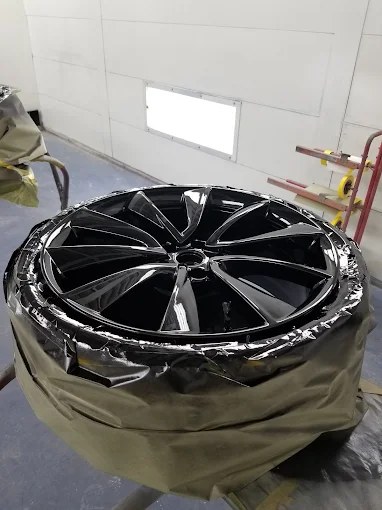 Gloss black wheel refinishing