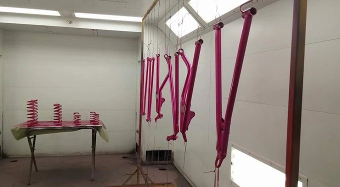 Suspension components hanging for refinishing