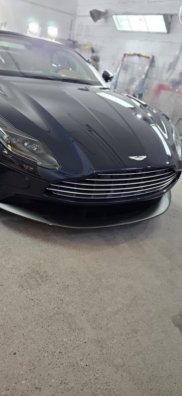 Dark Aston Martin at Kimber Auto Body and Paint