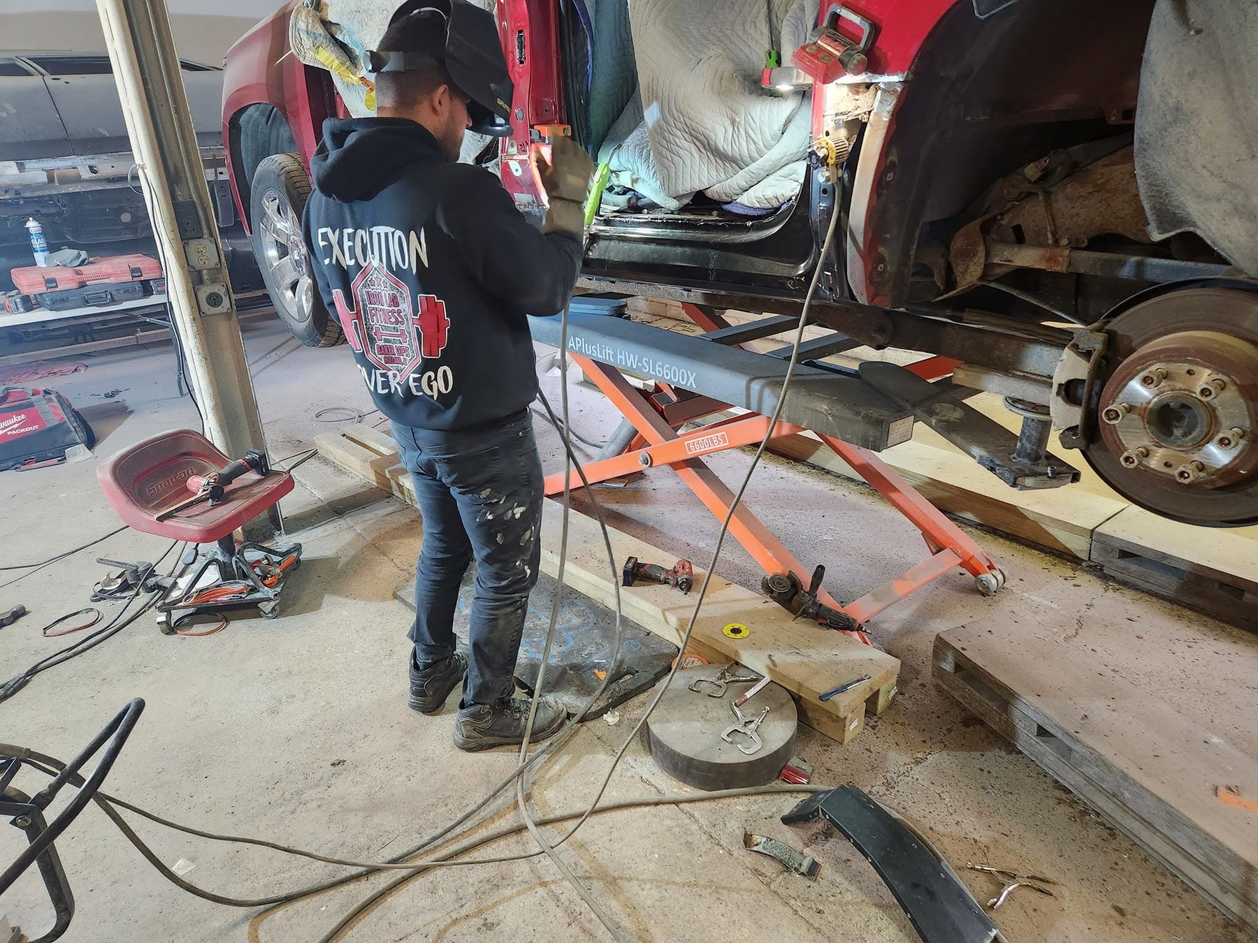 Kimber technician working on a vehicle repair